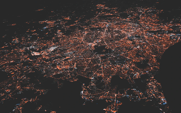 Overhead image of a city with blinking lights