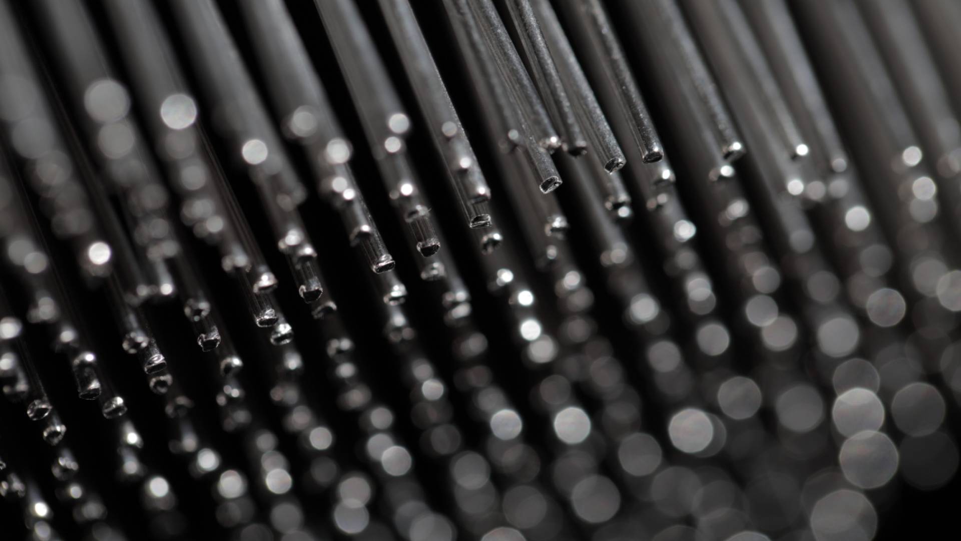 Grey pins on black background