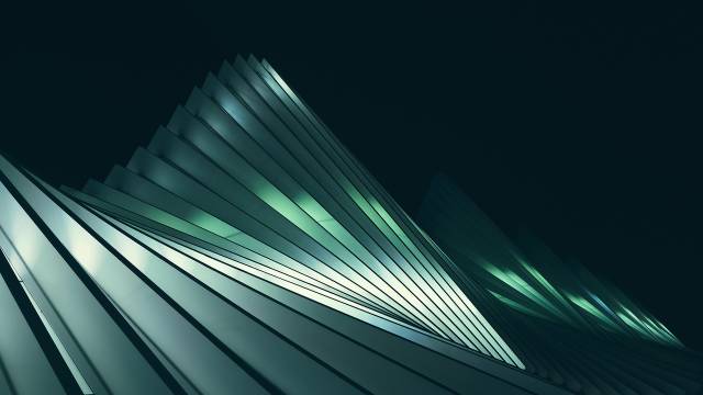 Silver and green pattern on the facade of a building