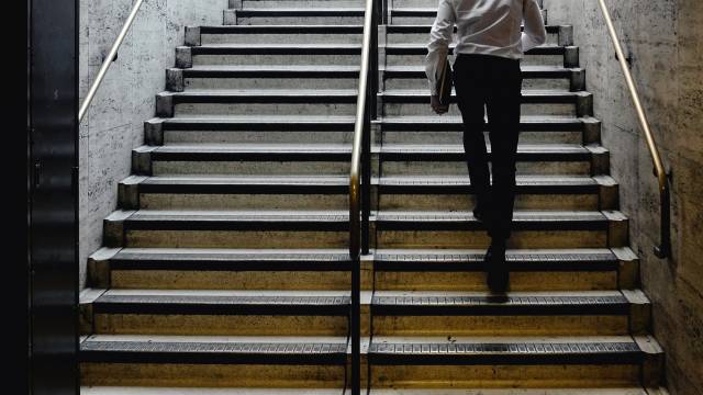 Person walking up stairs